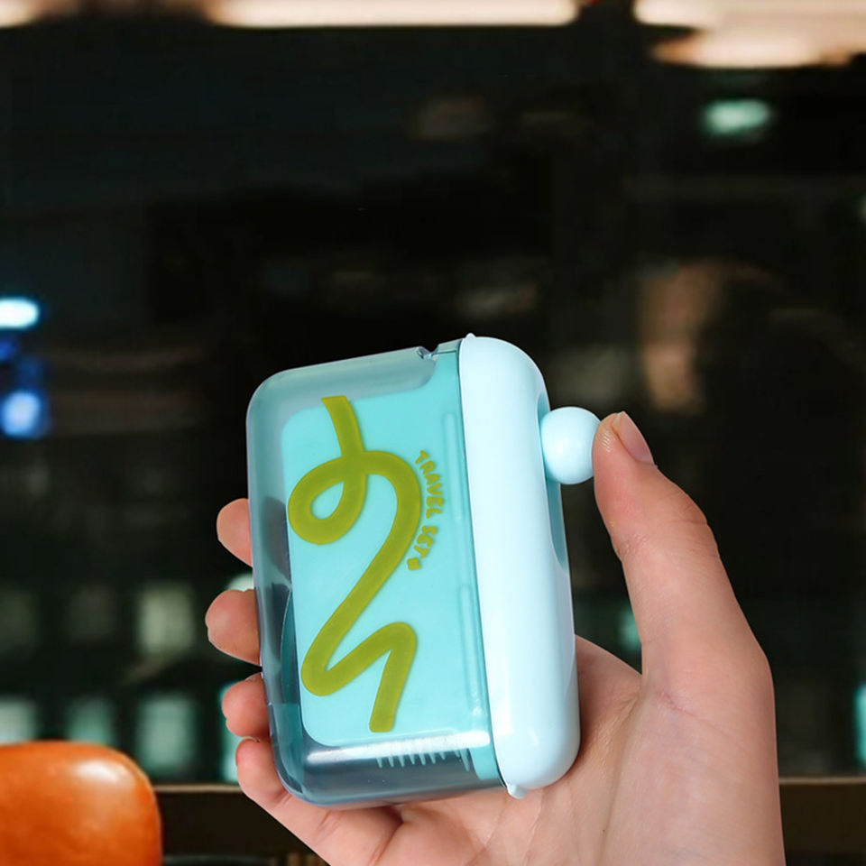 Floss Pick Dispenser in hand